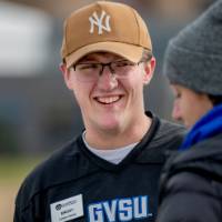 Career Center student employees talk to alumni during a social media video interview